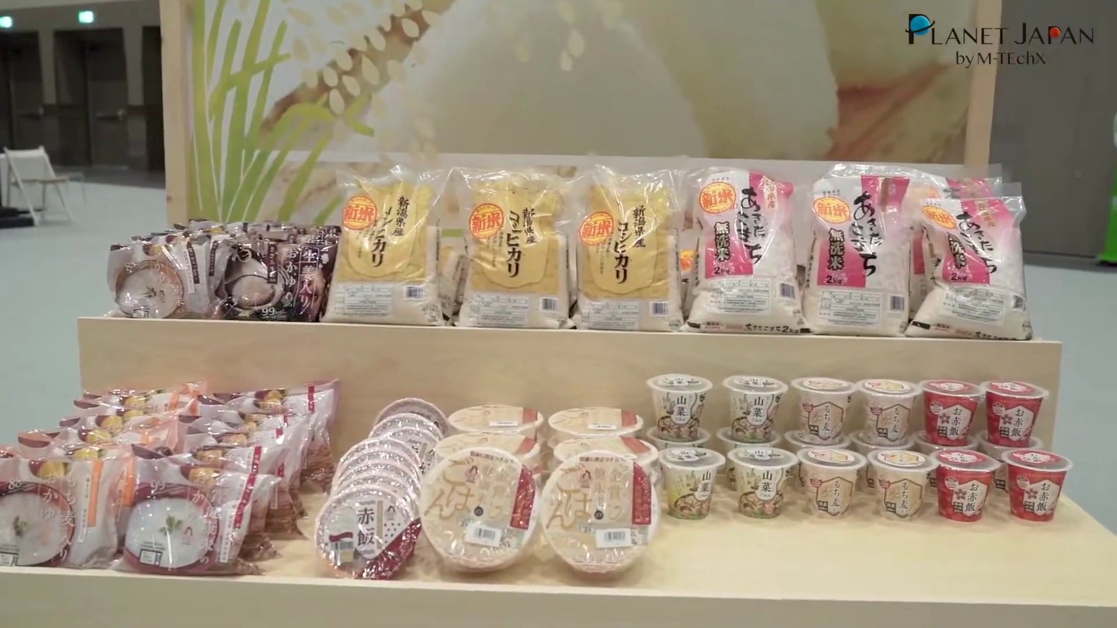 Tiered product display of packaged Japanese food at an exhibition stand